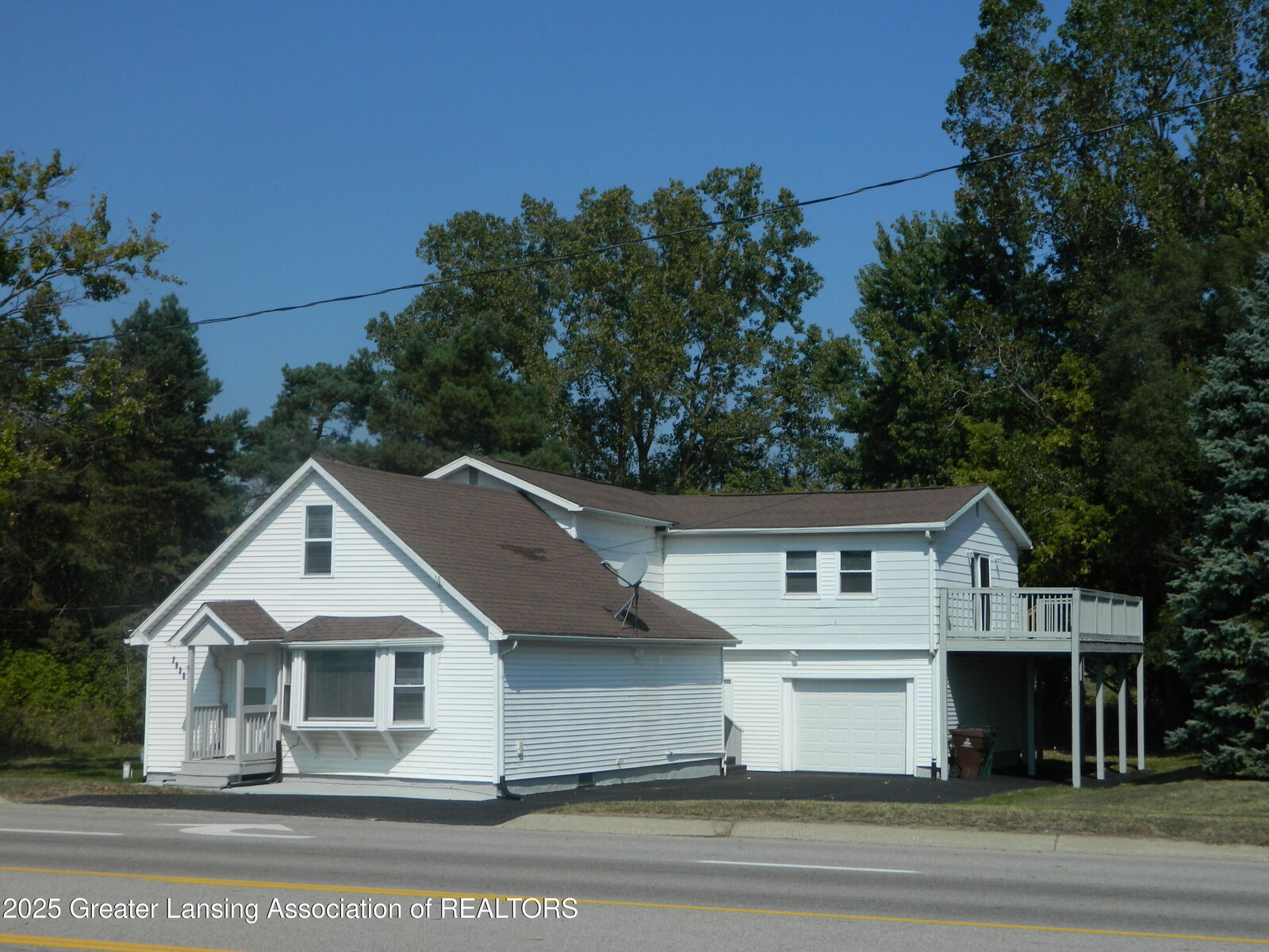 Property Photo:  2936 Jolly Road  MI 48864 