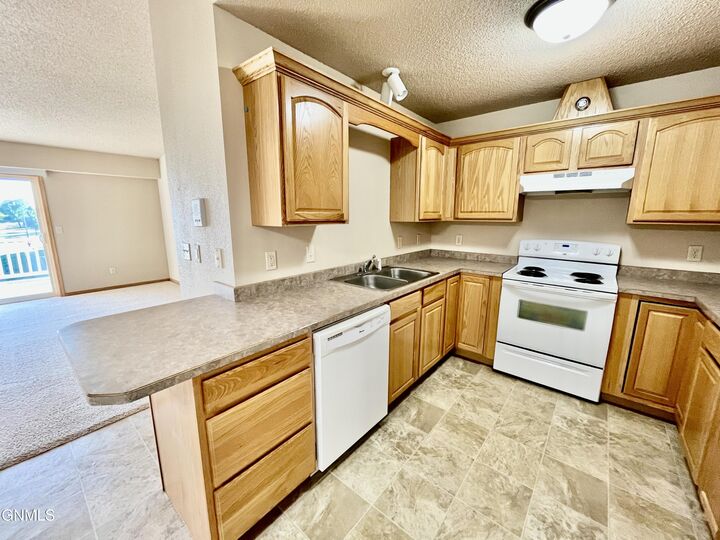 Property Photo: 4020 McKenzie Drive SE 7 ND 58554