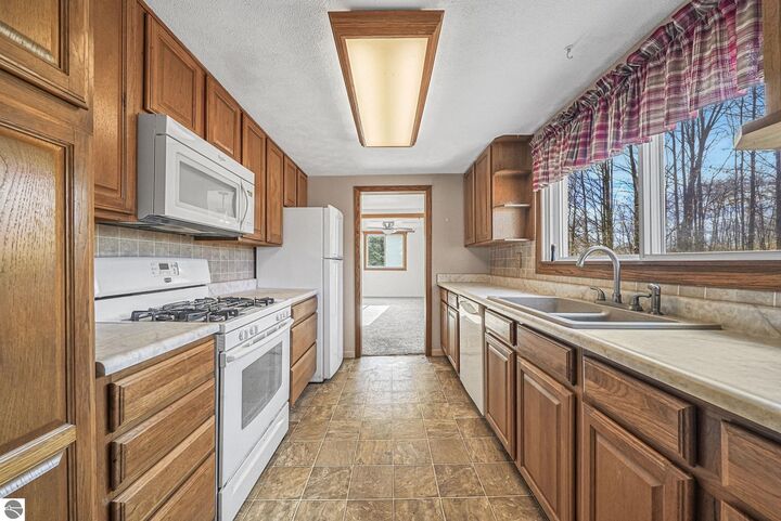 Property Photo:  185 N Three Mile Road  MI 49696 