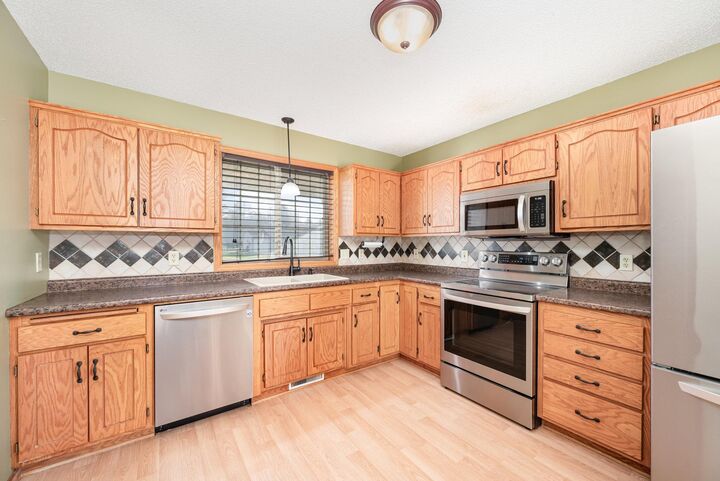 Property Photo:  335 Bluestem Avenue  MN 55379 