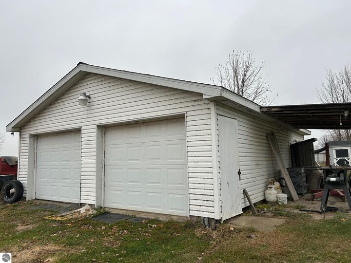 Property Photo:  3780 E North County Line Road  MI 48880 