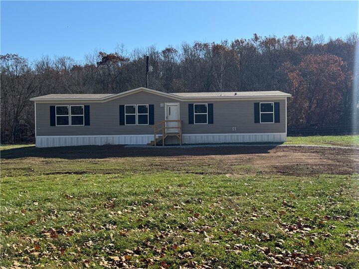 Property Photo:  6444 Madison  AR 72740 