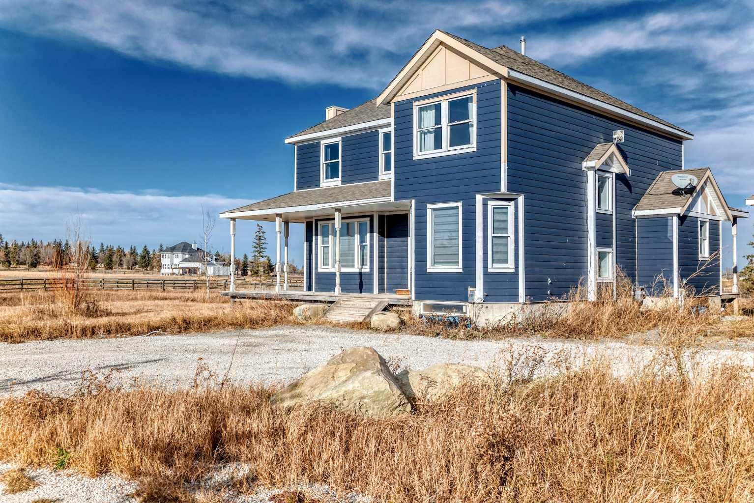 Property Photo: 266106 21 Street W AB T1S 1A2