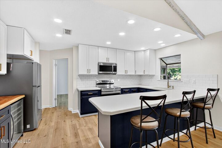 Property Photo:  7830 Maui Place  MS 39525 