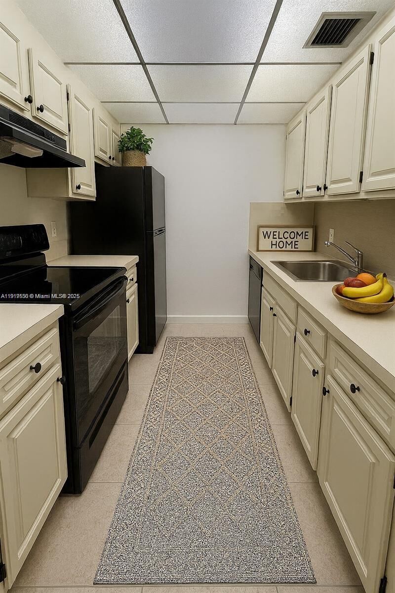 Property Photo:  300 SW 134th Way 107E  FL 33027 