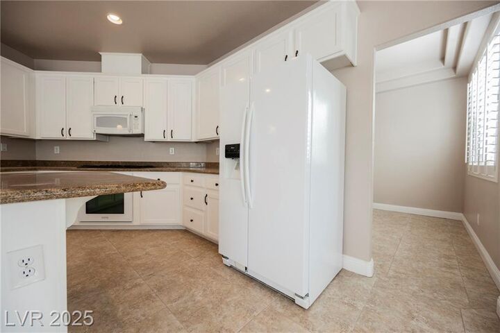 Property Photo:  9509 Gainey Ranch Avenue  NV 89147 