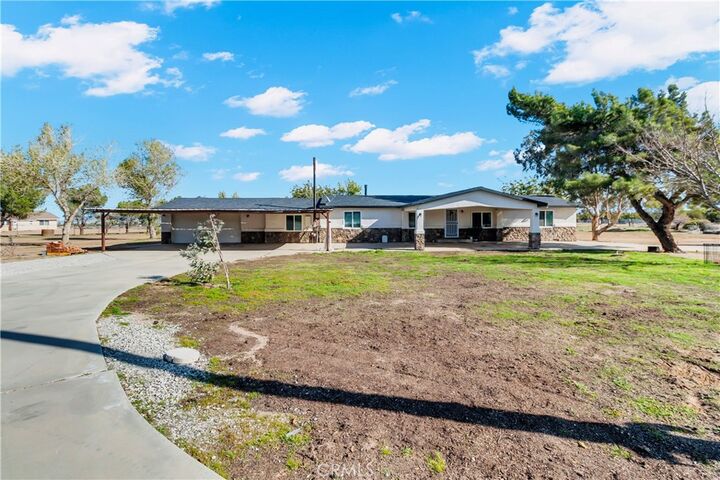 Property Photo:  9888 Trinity  CA 92344 