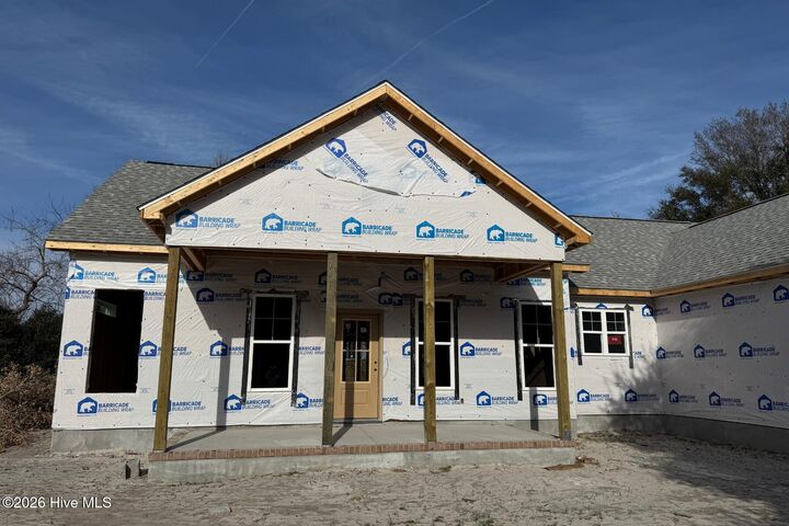 Property Photo:  6098 Turtlewood Drive  NC 28461 