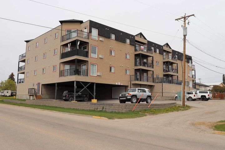 Property Photo: 5037 7 Avenue 305 AB T7E 0A8