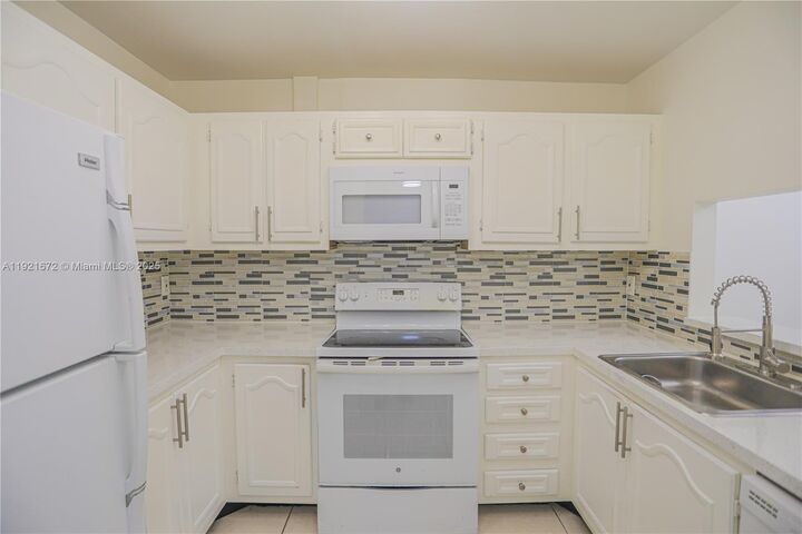 Property Photo: 13685 NE 10th Ave 209 FL 33161