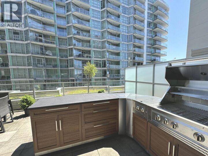 Property Photo:  185 Victory Ship Way 202  BC V7L 0G2 