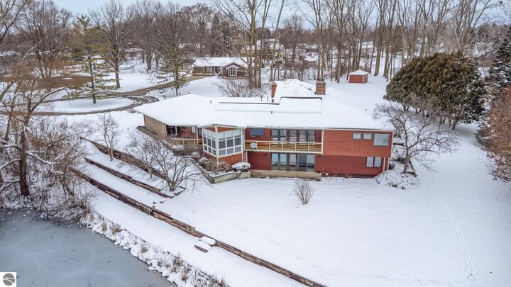 Property Photo:  5390 Pheasant Court  MI 48801 