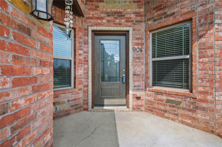 Property Photo:  904 SW Caprington Street  AR 72712 