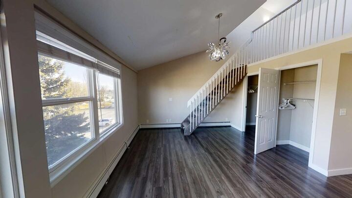 Property Photo:  7201 Poplar Drive 4204  AB T8V 6C5 