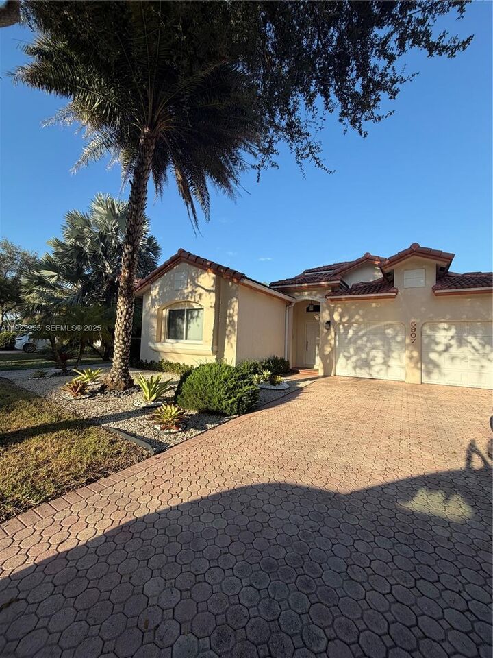 Property Photo:  5907 NW 110th Ct  FL 33178 