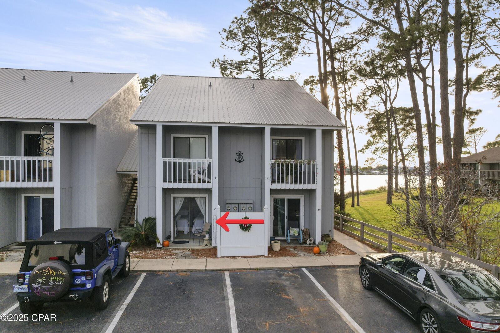 Property Photo: 6909 N Lagoon Drive 3E FL 32408