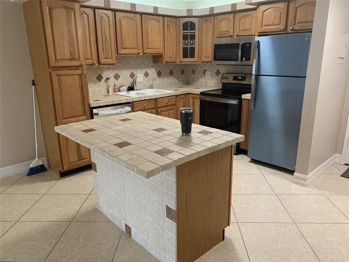 Property Photo: 253 S Cypress Rd 225 FL 33060