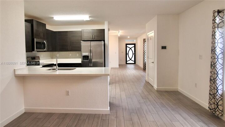 Property Photo: 561 NE 6th Pl FL 33034