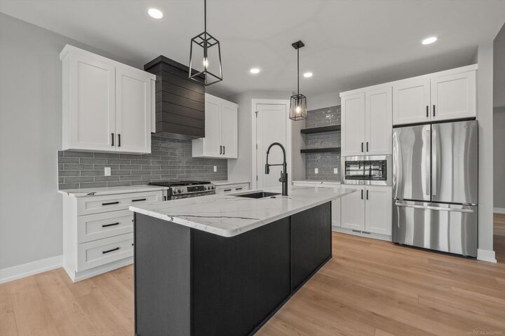 Property Photo: 5865 Heights Drive Unit 1 / Building 1 MI 48314