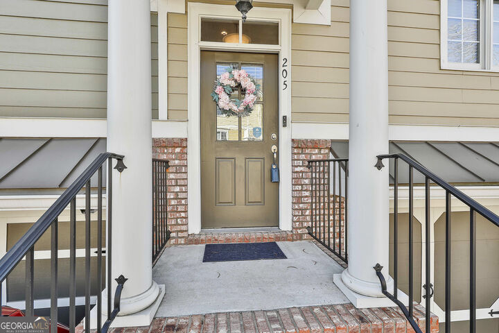 Property Photo:  205 Lexington Village  GA 30269 