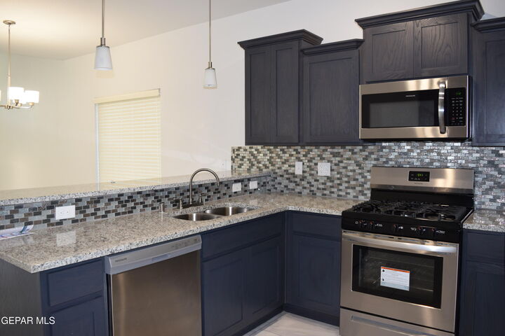 Property Photo:  1103 Nickel Hill Avenue  NM 88008 