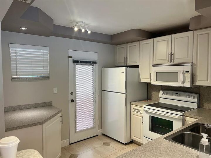 Property Photo: 403 NW 68th Ave 202 FL 33317