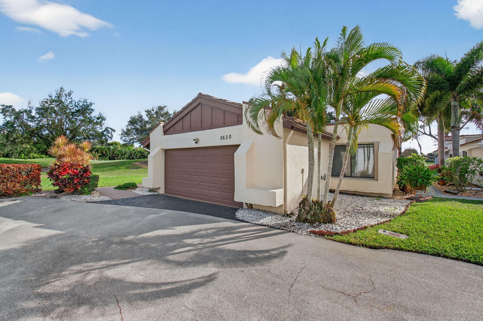 Property Photo:  5630 Piping Rock Drive  FL 33437 