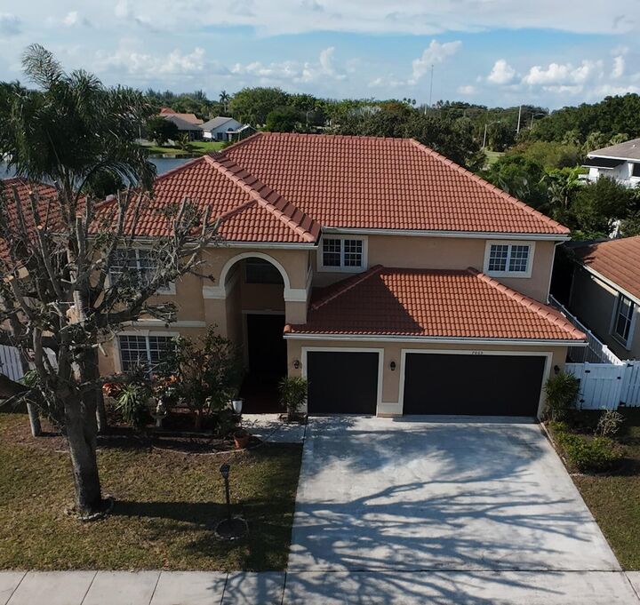 Property Photo: 7065 Catalina Isle Drive FL 33467