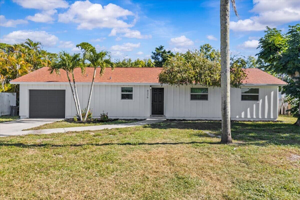 Property Photo: 8379 SE Camellia Drive FL 33455