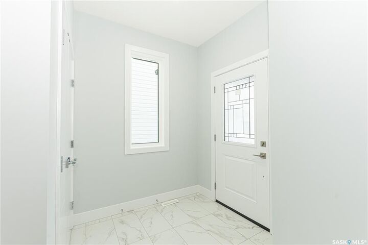 Property Photo:  521 Sharma Crescent  SK S7W 0Z5 