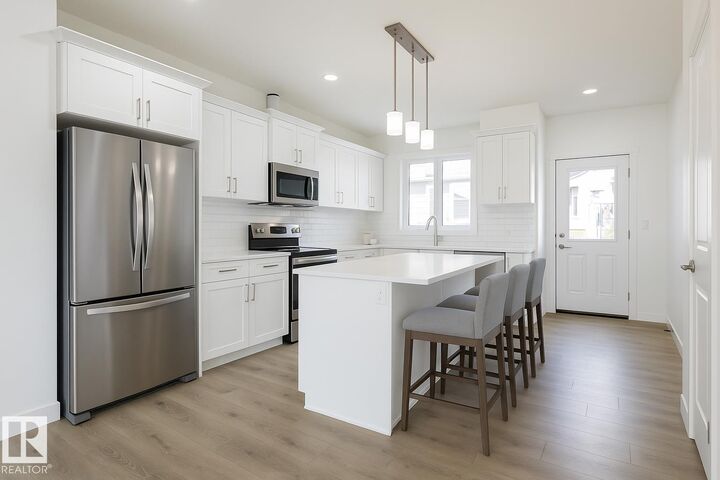 Property Photo:  604 Ashgrove Circle  AB T9E 0K8 