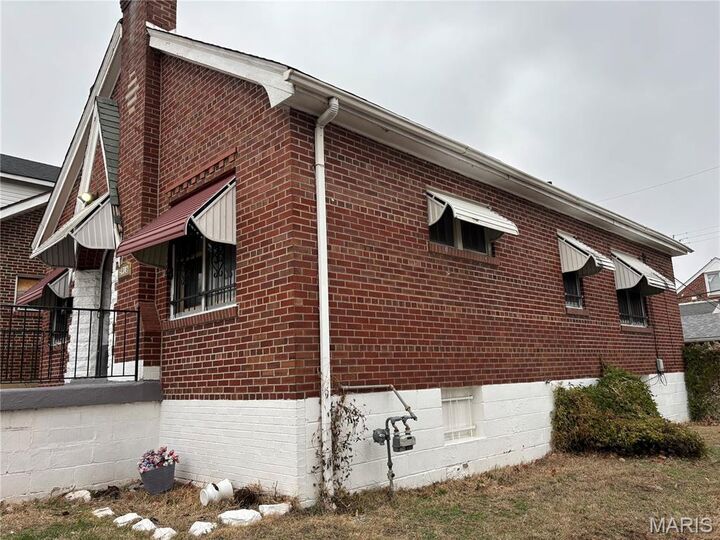 Property Photo:  5916 Alpha Avenue  MO 63147 