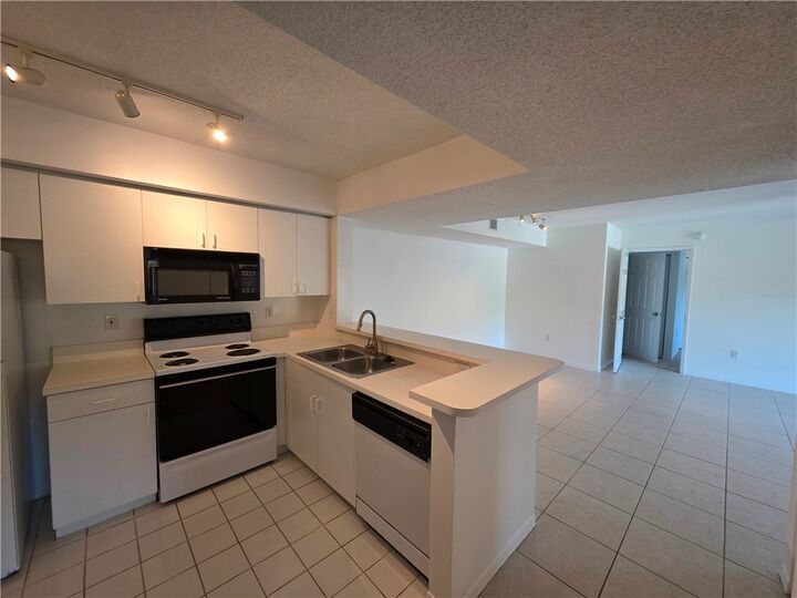 Property Photo:  1640 N 42nd Circle N 209  FL 32967 