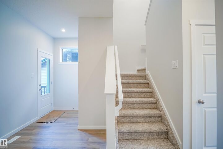 Property Photo:  111 Ficus Way  AB T8L 0Z6 