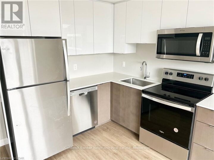 Property Photo:  708 Woolwich Street 406  ON N1H 7G6 