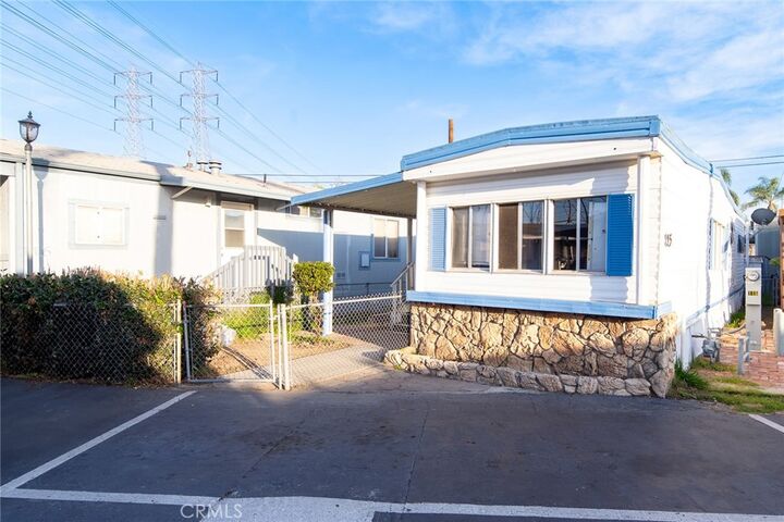 Property Photo:  8811 Park 115  CA 90706 