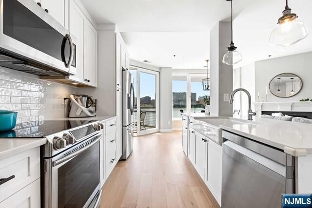 Property Photo:  600 Harbor Boulevard 934/936  NJ 07086 