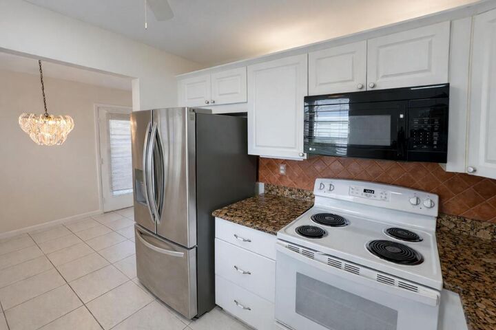 Property Photo:  251 Piedmont F  FL 33484 