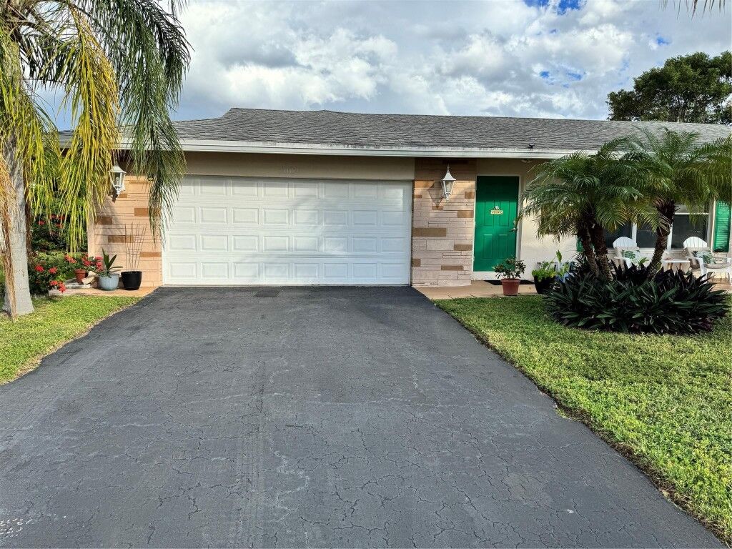 Property Photo:  7002 NW 93rd Avenue  FL 33321 