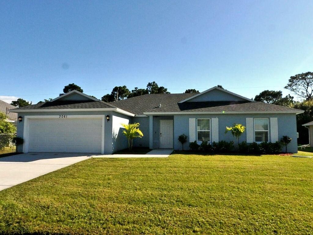 Property Photo: 3061 SW Briggs Street FL 34953