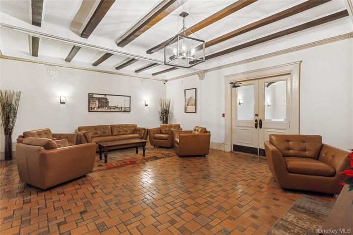 Property Photo: 310 Riverside Boulevard 1H NY 11561