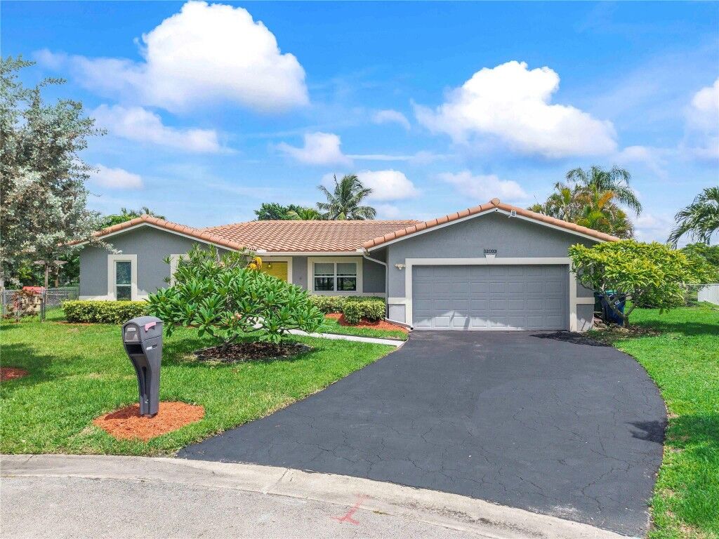 Property Photo:  12033 NW 29th Street  FL 33065 