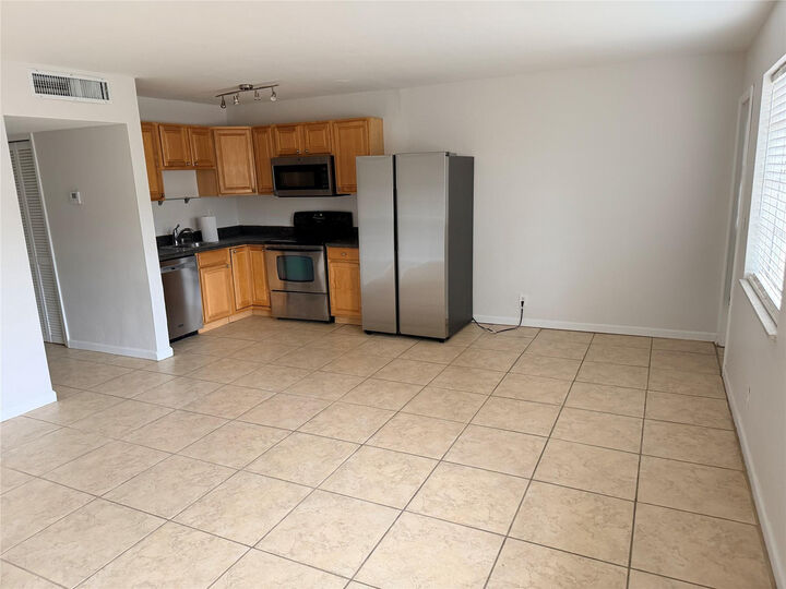 Property Photo: 4051 NE 13th Avenue 52-3 FL 33334