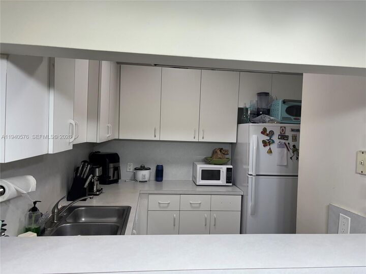 Property Photo:  12645 SW 91st St 201-4  FL 33186 