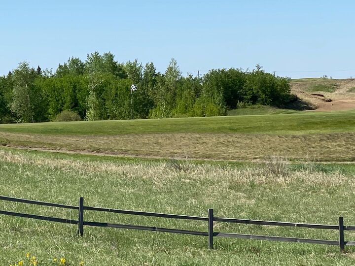 Property Photo: 402 Sand Hills Drive AB T4J 1R3