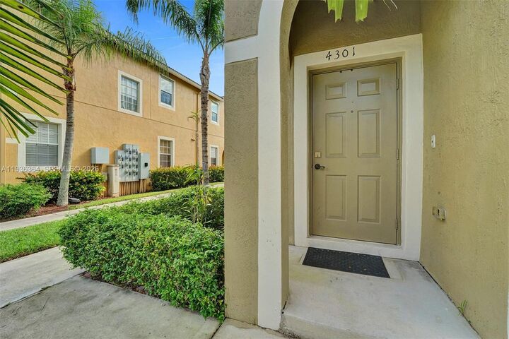 Property Photo:  4301 SW 131st Ln 3202  FL 33027 