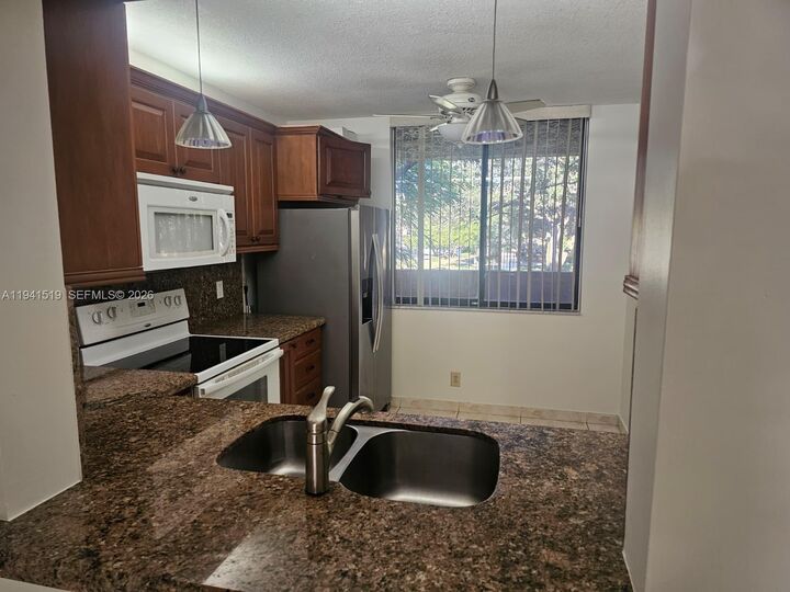 Property Photo:  8592 W Sunrise Blvd 209  FL 33322 