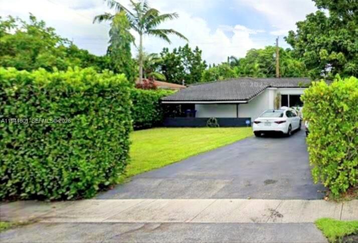 Property Photo:  1780 NE 173 St  FL 33162 