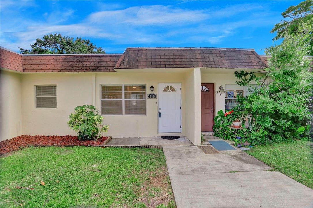 Property Photo:  3643 SW Natura Avenue C  FL 33441 