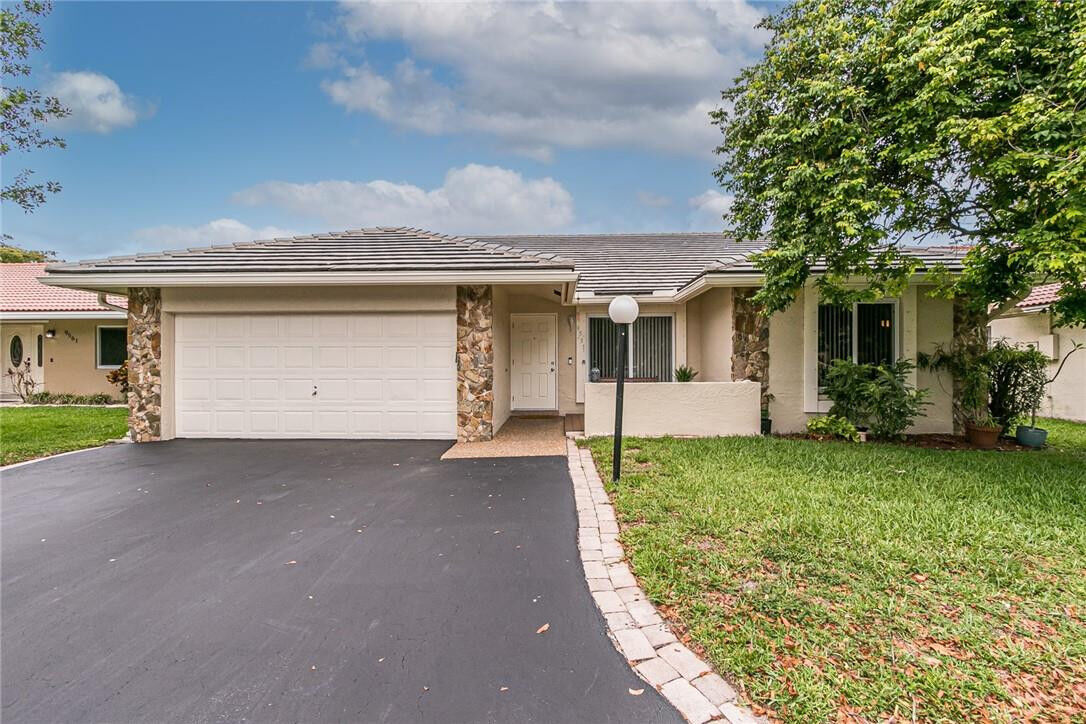 Property Photo:  9531 Shadow Wood Lane  FL 33071 